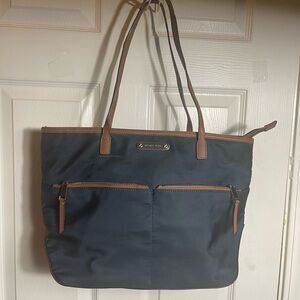 Michael Kors  Nylon Navy Blue Tote with leather Brown Trim and straps ..